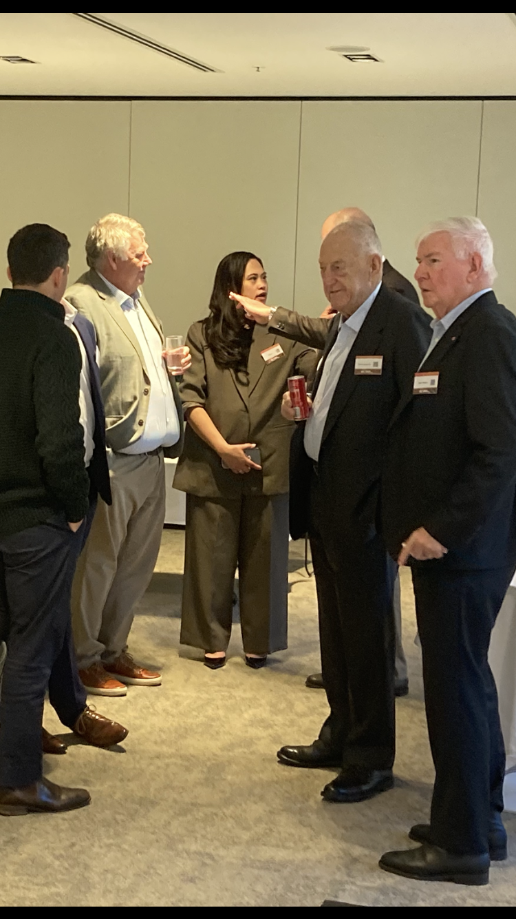 Guests in conversation at the EORA Energy industry roundtable in Sydney — photograph 2