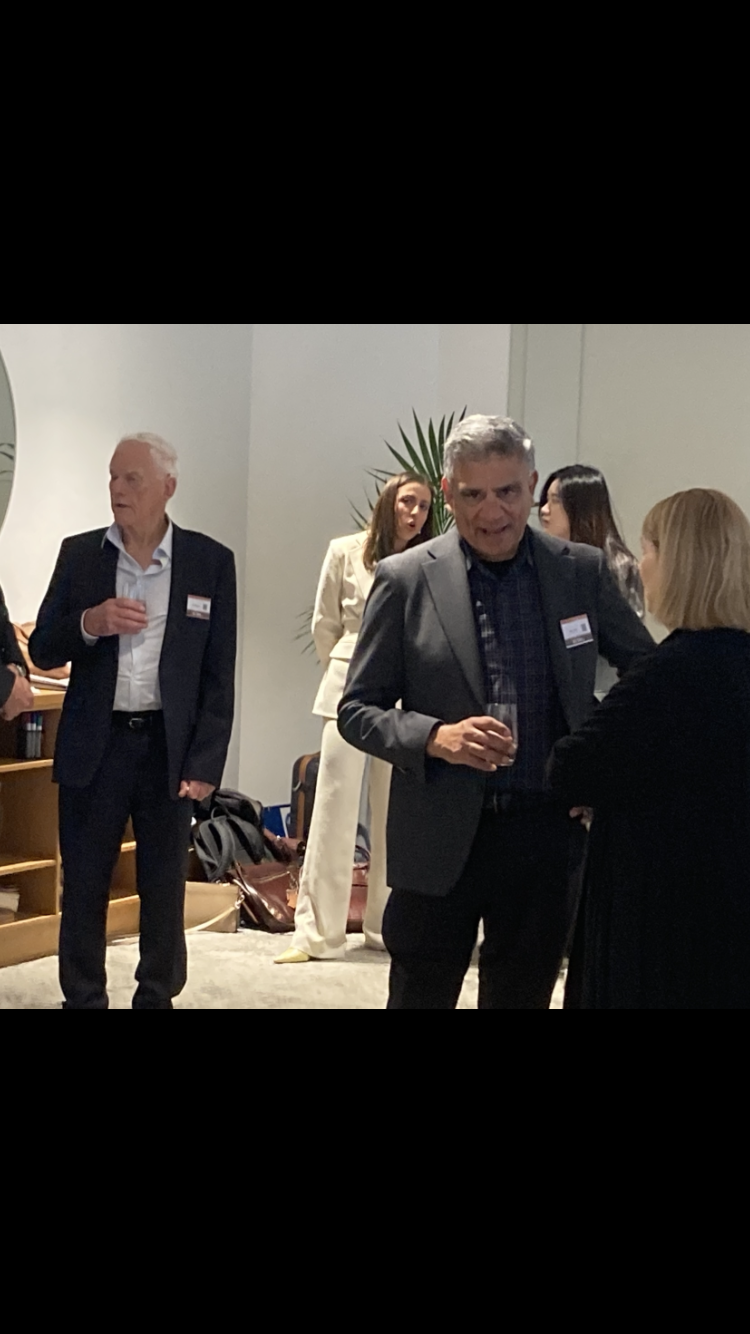 Guests in conversation at the EORA Energy industry roundtable in Sydney — photograph 4